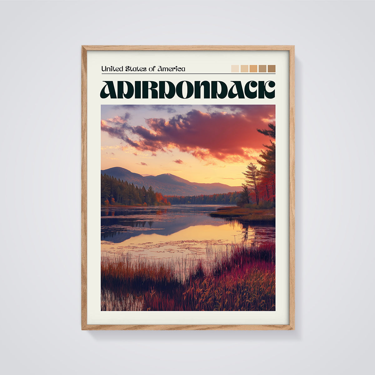 Adirondack Sunset Lake Print framed in oak on a grey background