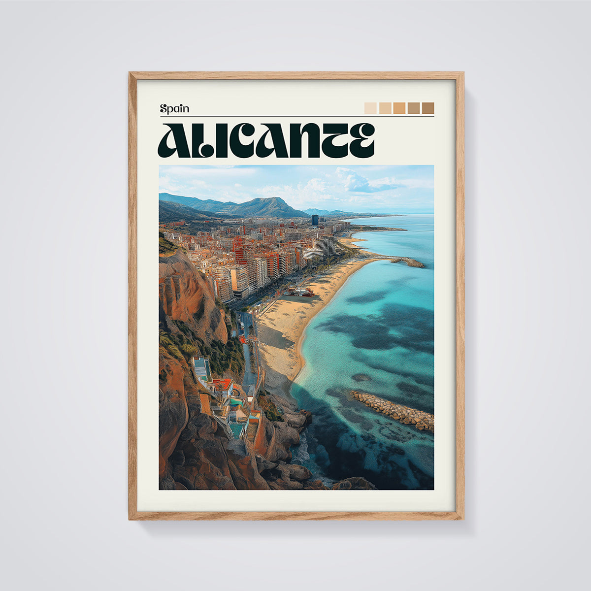 Alicante Coastal City Print framed in oak on a grey background
