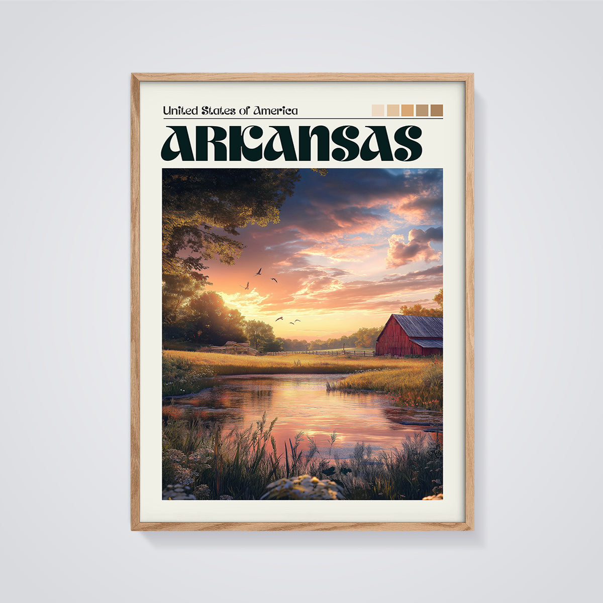 Arkansas Sunset Barn Print framed in oak on a grey background