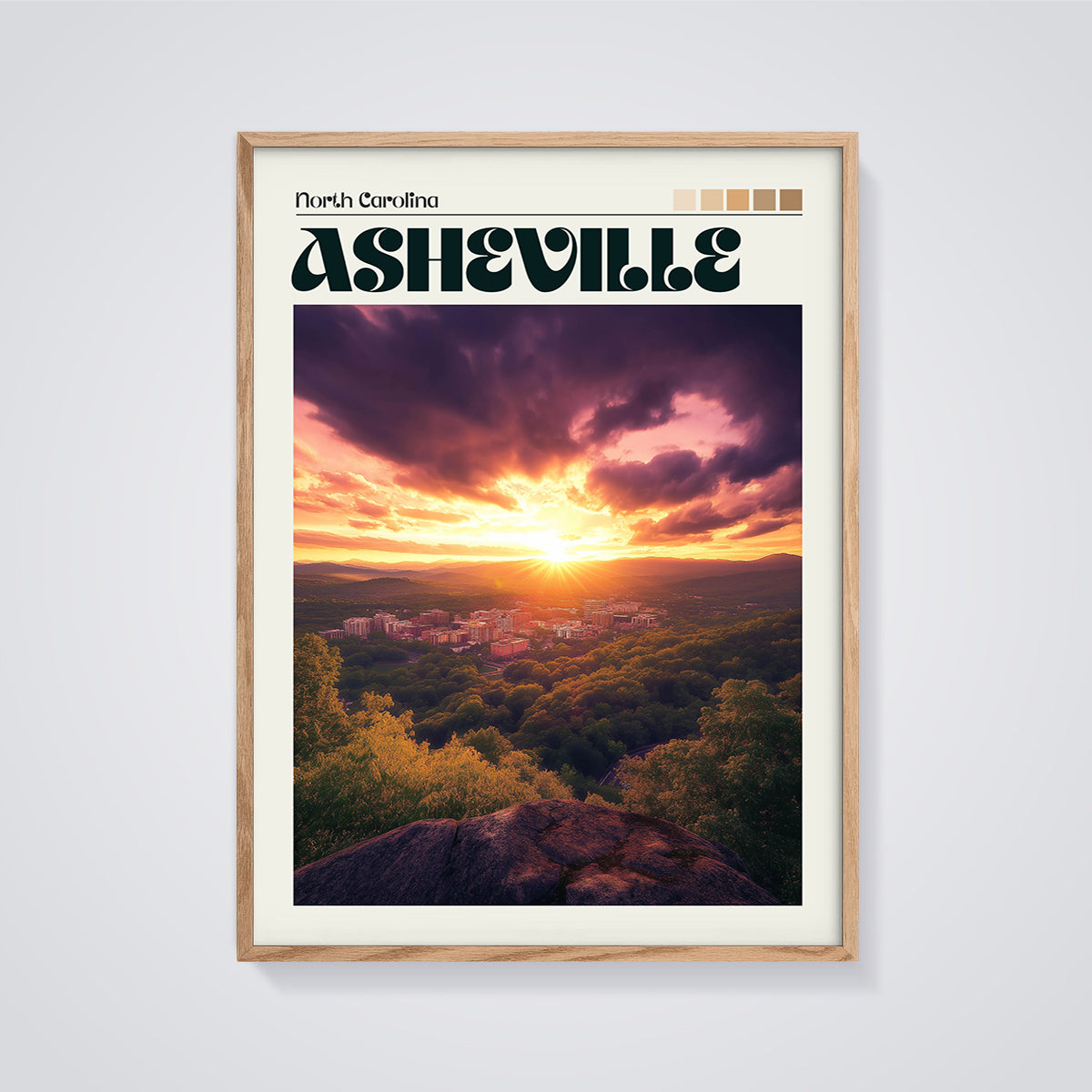 Asheville Sunset Cityscape Print framed in oak on a grey background