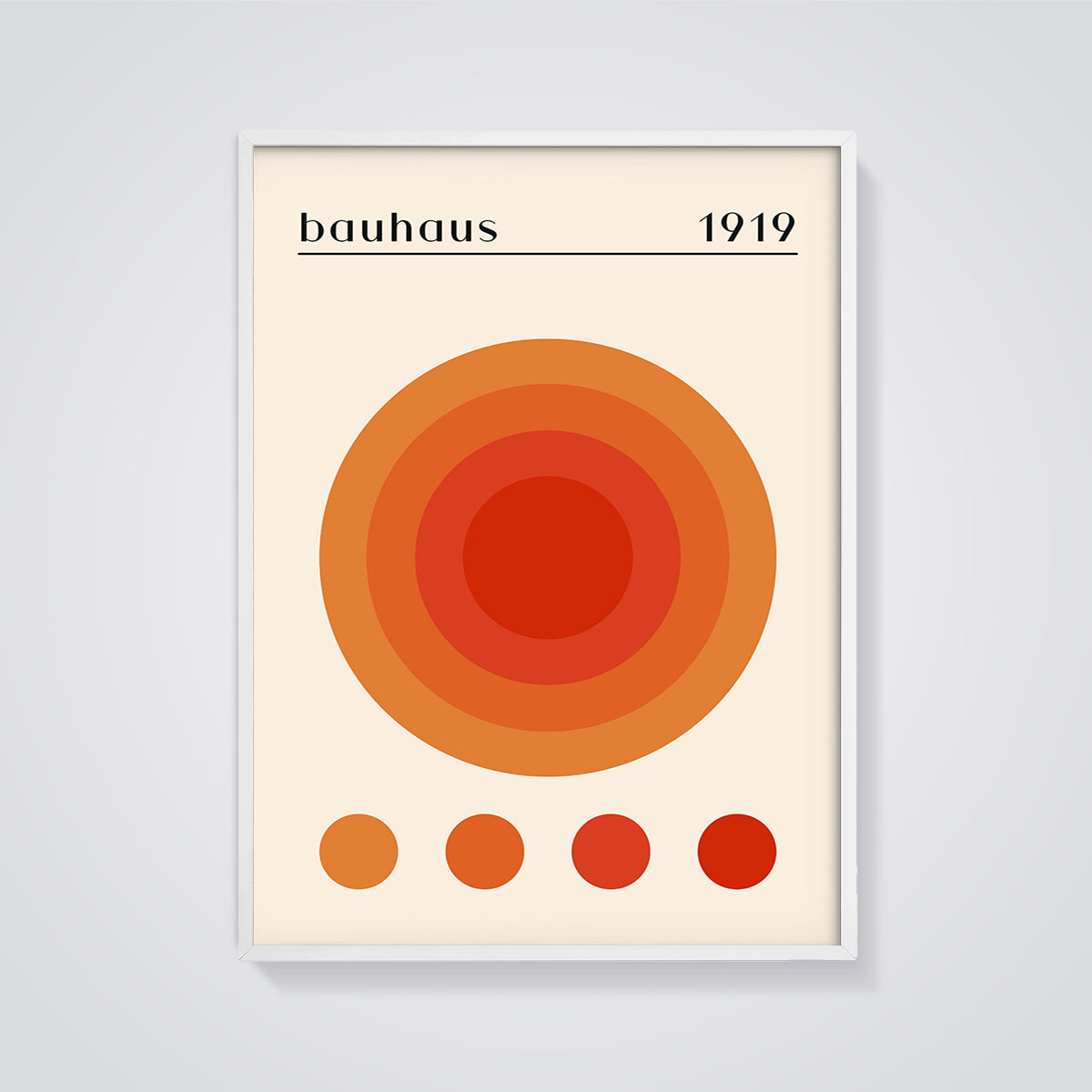 Bauhaus 1919 Concentric Orange Circles Print framed in white on a grey background