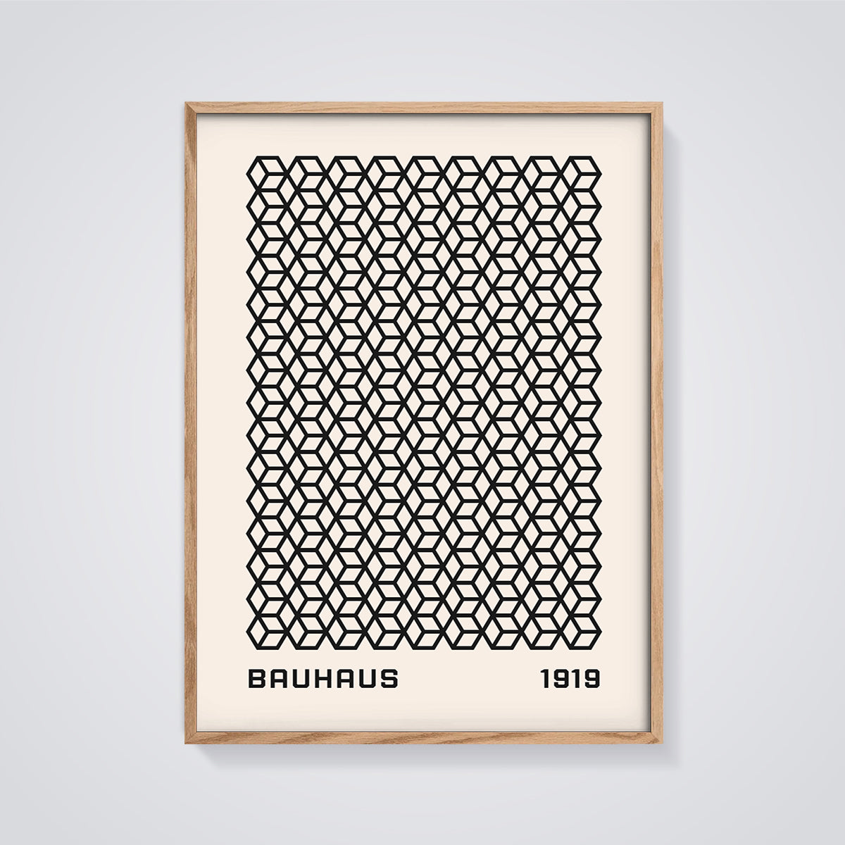 Bauhaus 1919 Geometric Cubes Pattern Print framed in oak on a grey background