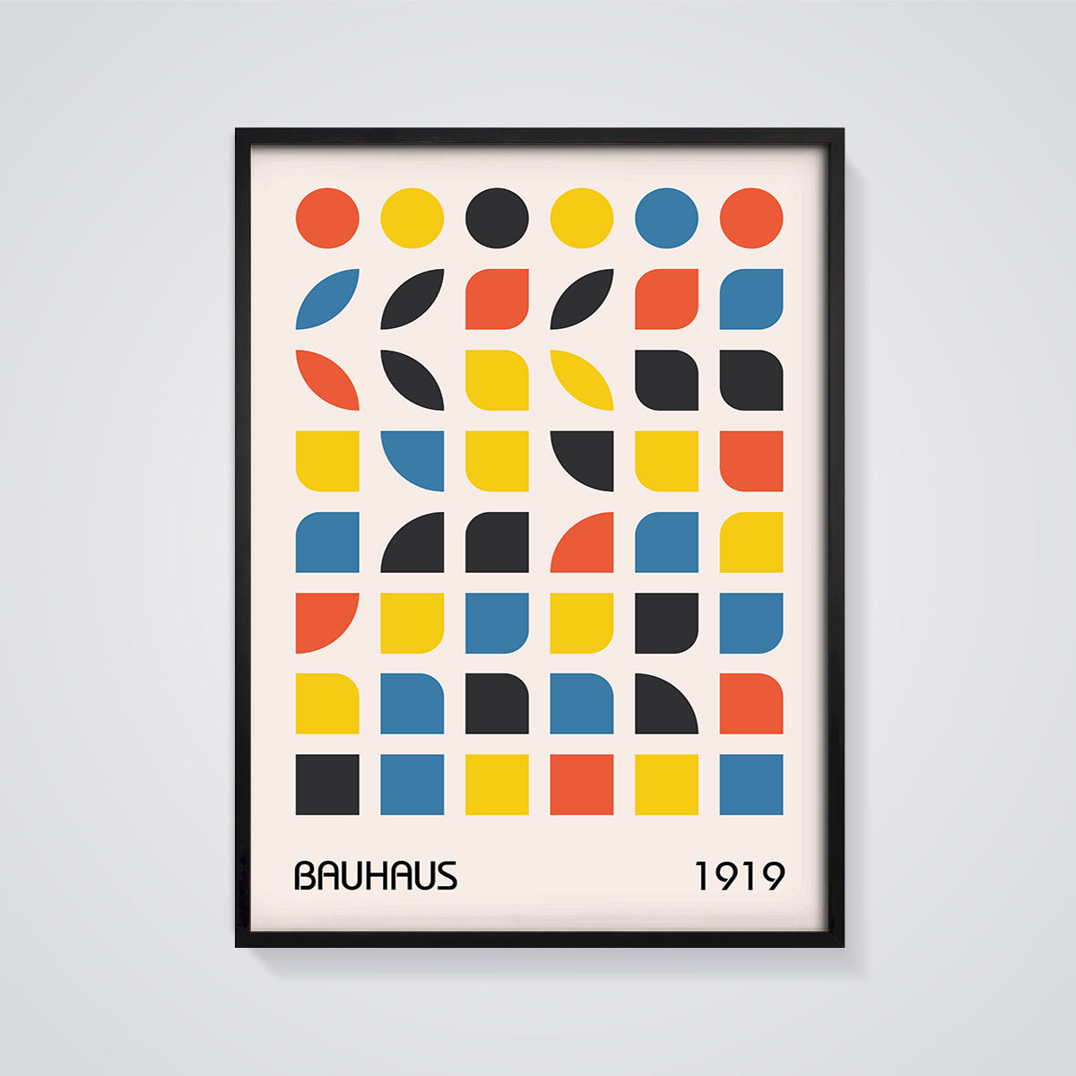 Bauhaus 1919 Geometric Grid Print framed in black on a grey background