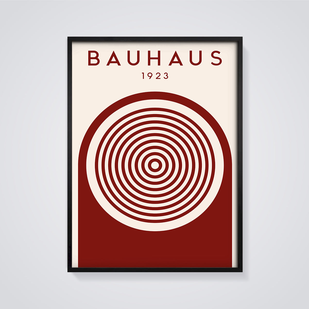 Bauhaus 1923 Concentric Arch Print framed in black on a grey background
