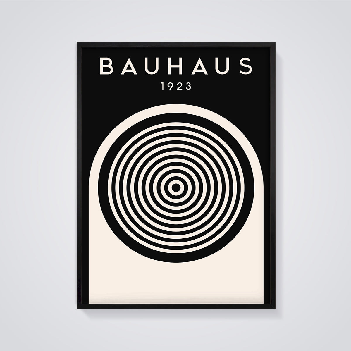 Bauhaus 1923 Concentric Circles Print framed in black on a grey background