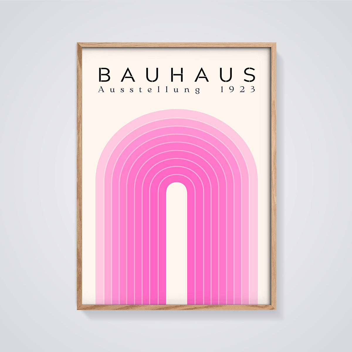 Bauhaus 1923 Pink Arch Print framed in oak on a grey background