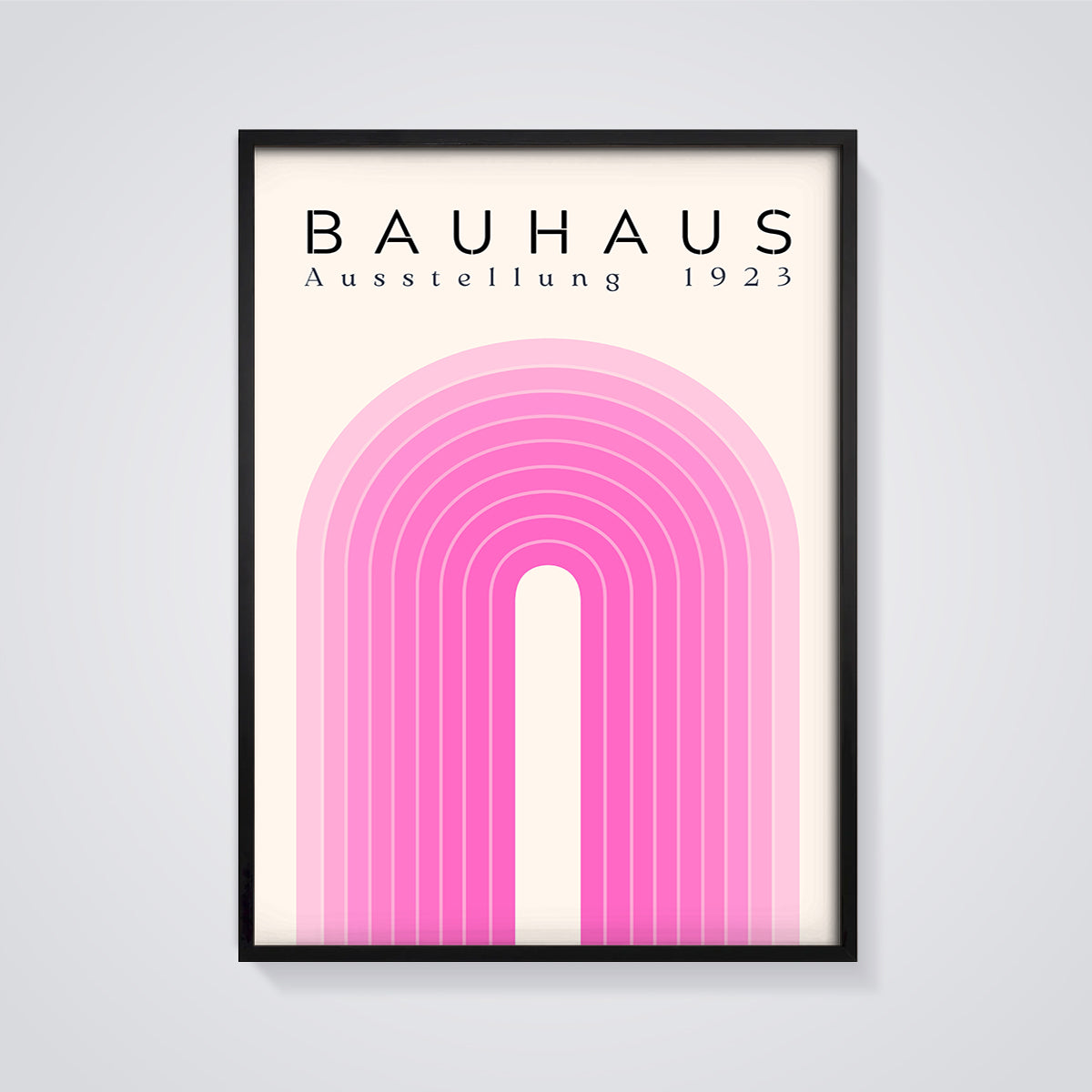 Bauhaus 1923 Pink Arch Print framed in black on a grey background