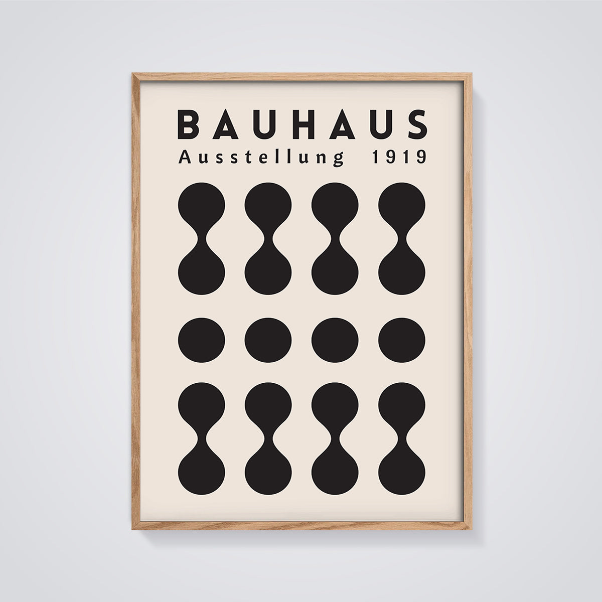 Bauhaus Ausstellung 1919 Shapes Print framed in oak on a grey background