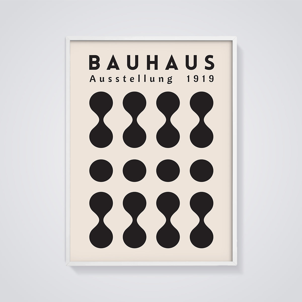 Bauhaus Ausstellung 1919 Shapes Print framed in white on a grey background