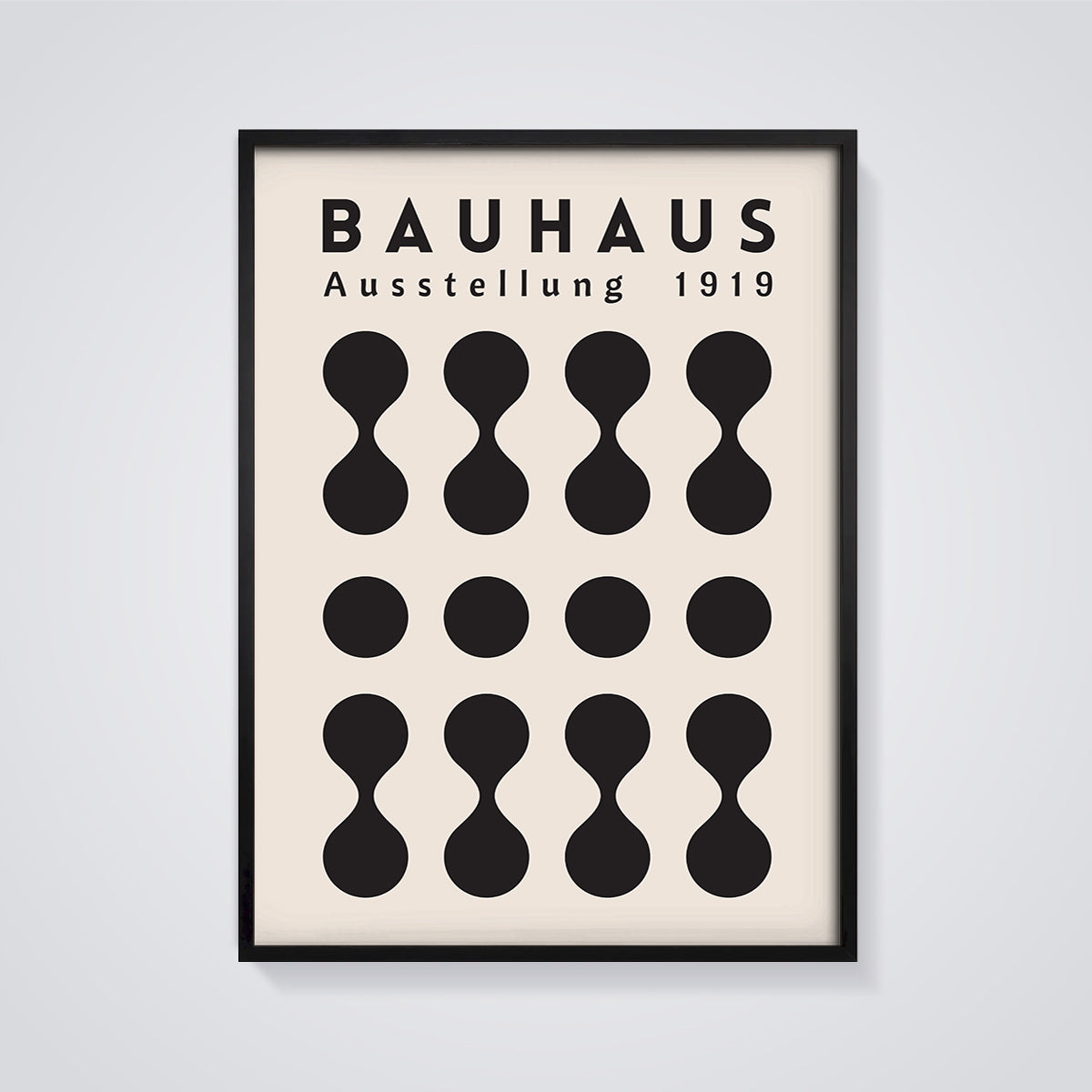 Bauhaus Ausstellung 1919 Shapes Print framed in black on a grey background