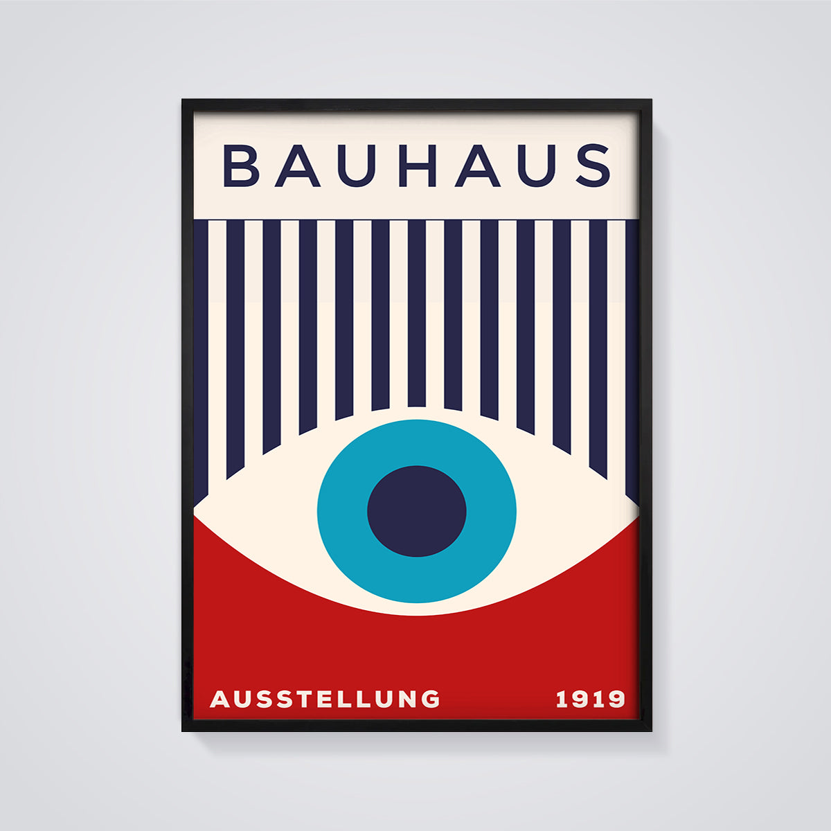 Bauhaus Exhibition Eye Print framed in black on a grey background