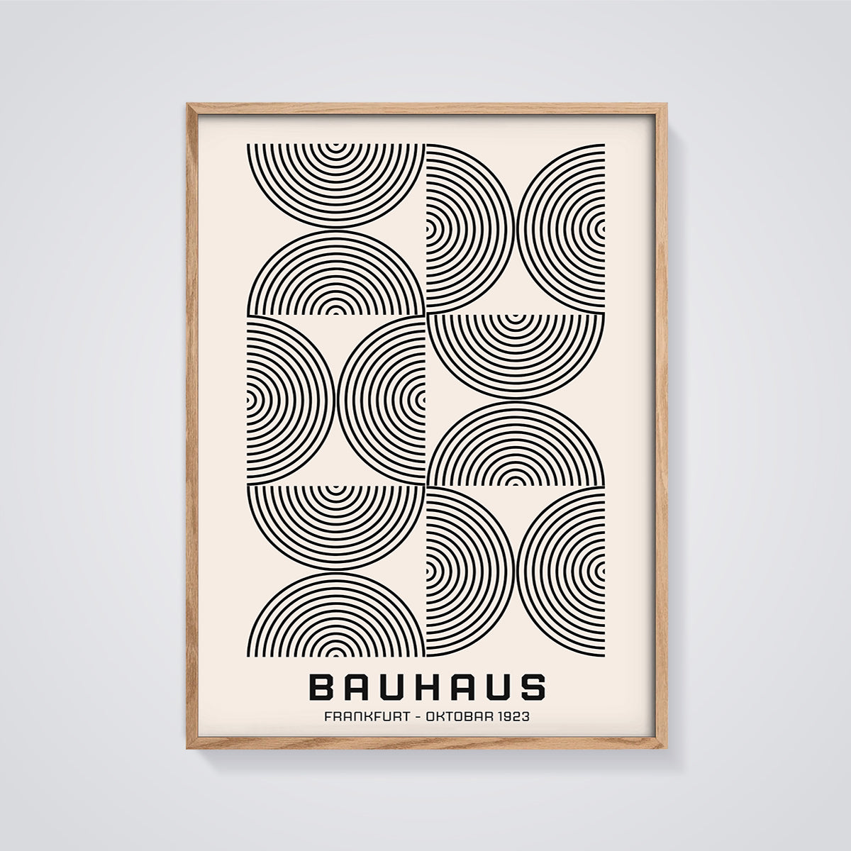 Bauhaus Geometric Circles Print framed in oak on a grey background