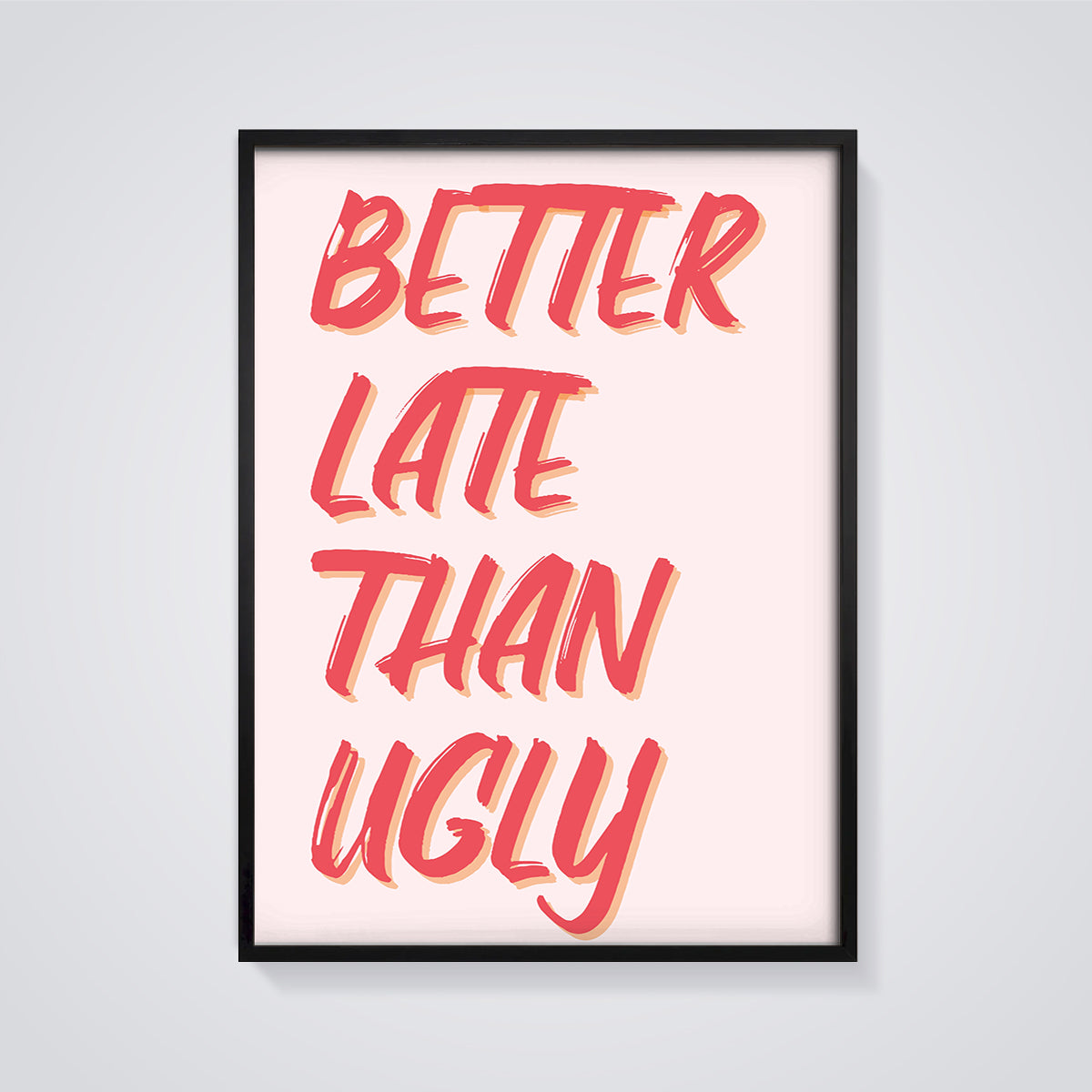 Better Late Than Ugly Quote Print framed in black on a grey background
