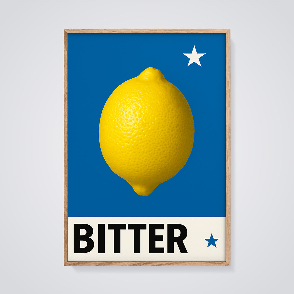 Bitter Lemon Print framed in oak on a grey background