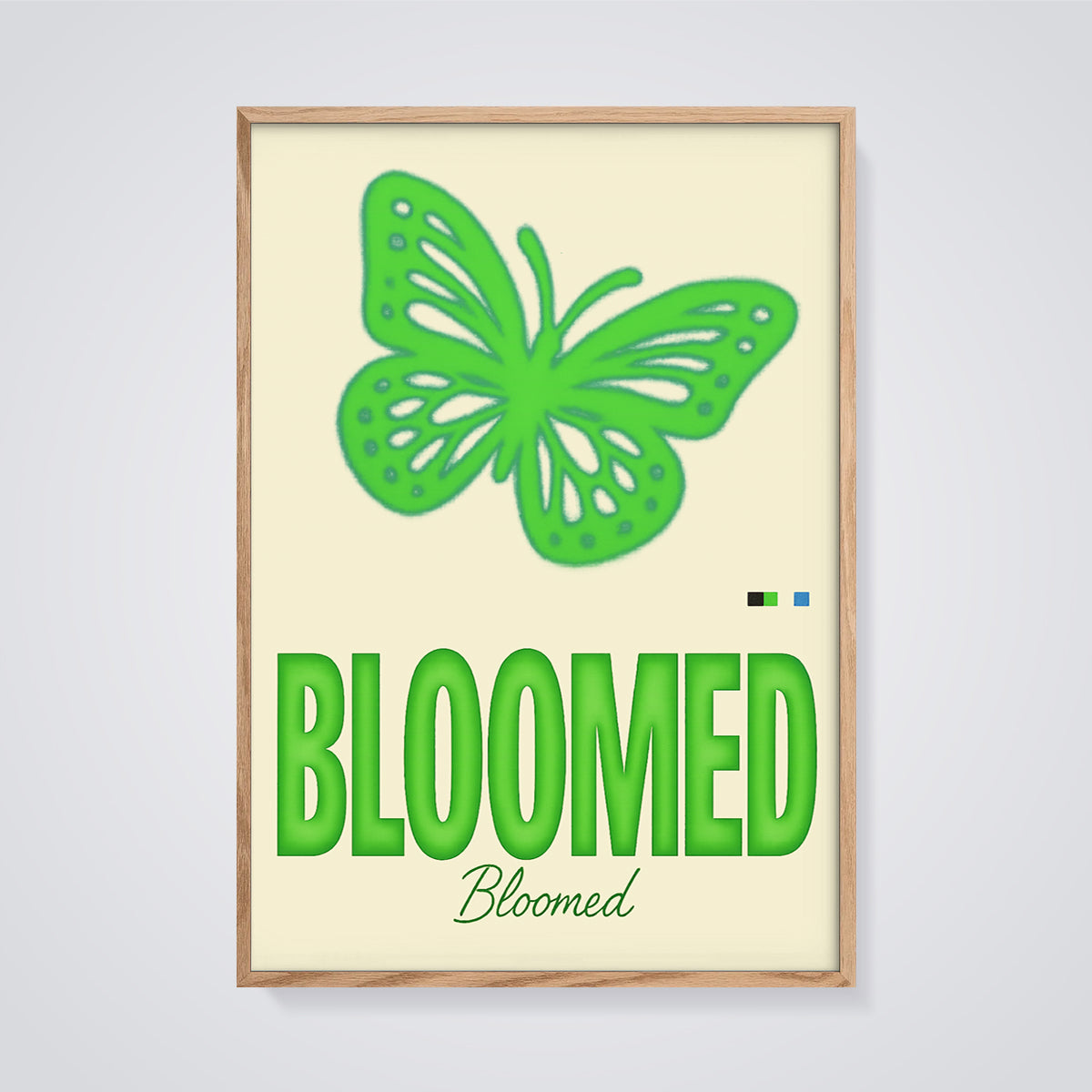 Bloomed Green Butterfly Print framed in oak on a grey background
