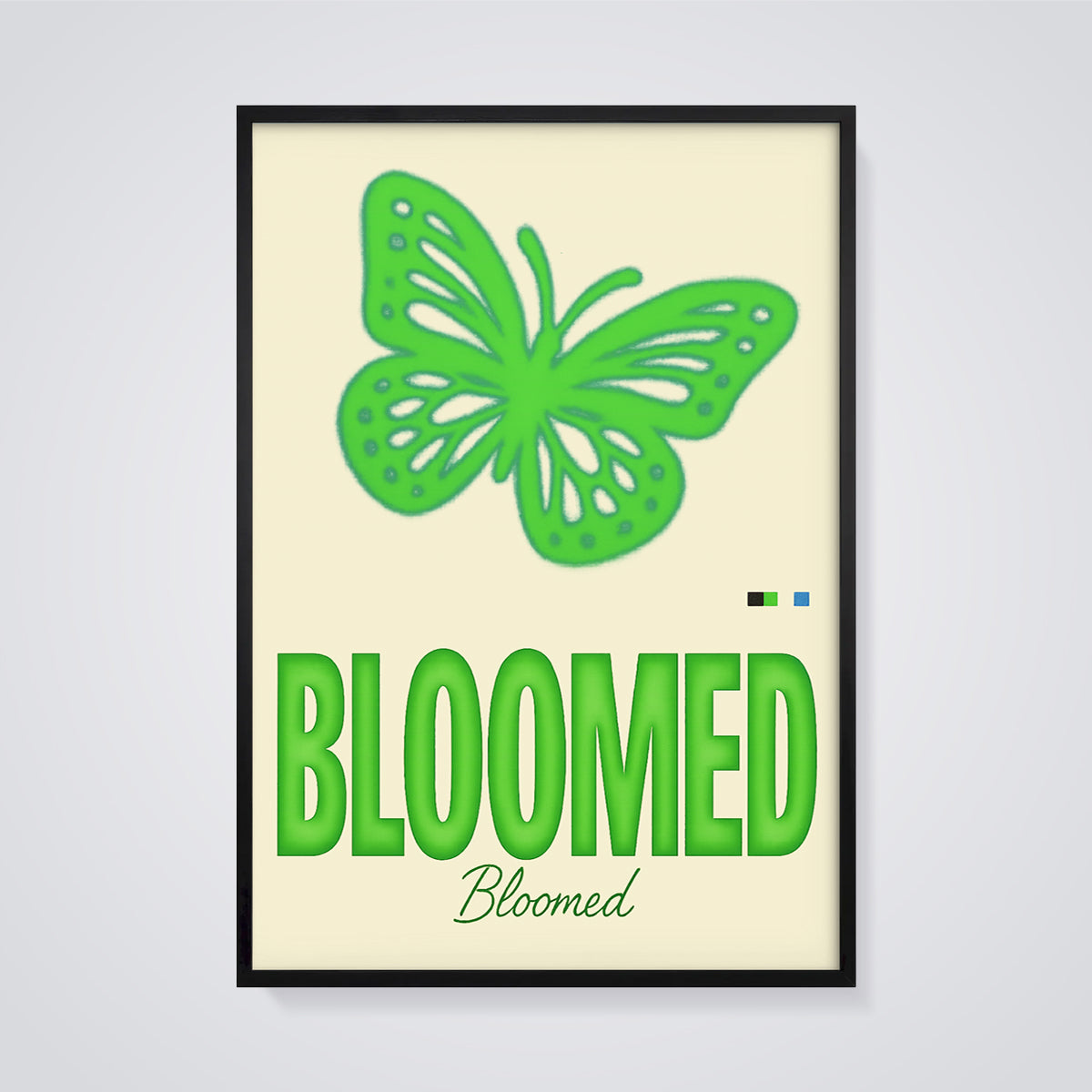 Bloomed Green Butterfly Print framed in black on a grey background