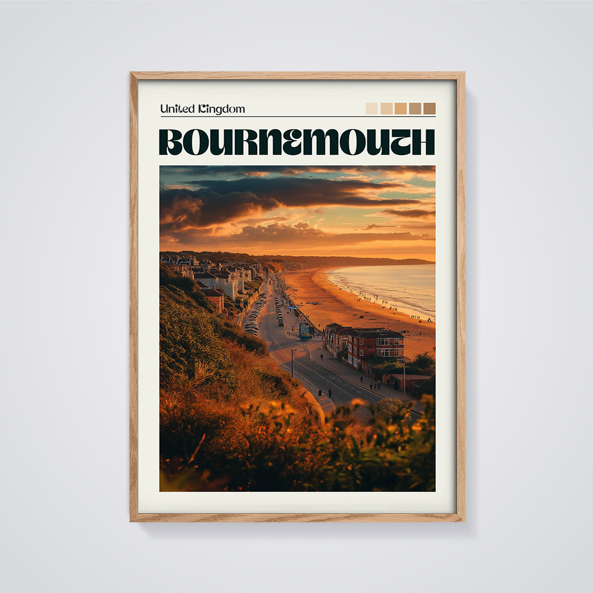 Bournemouth Sunset Beach Print framed in oak on a grey background