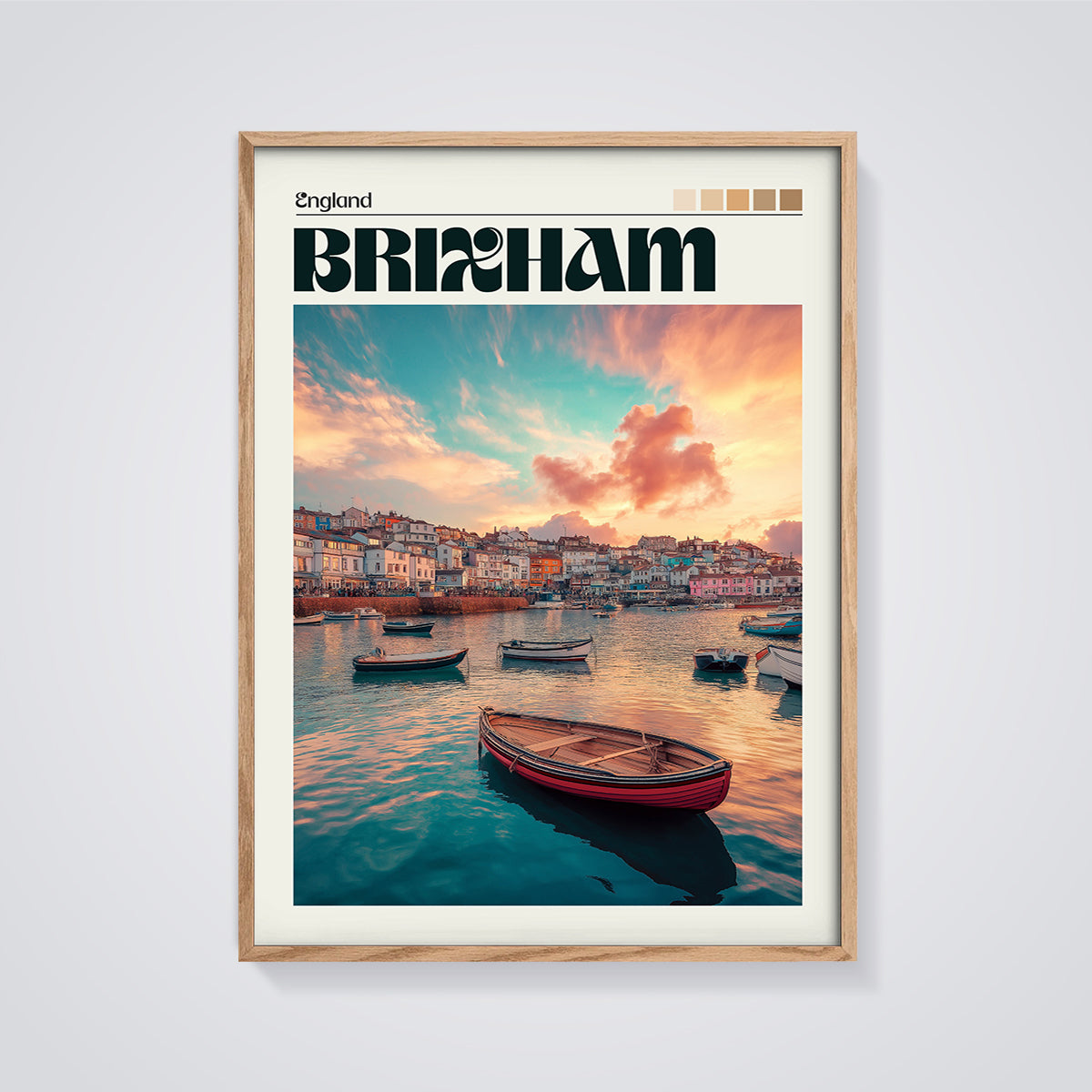 Brixham Harbor Sunset Print framed in oak on a grey background