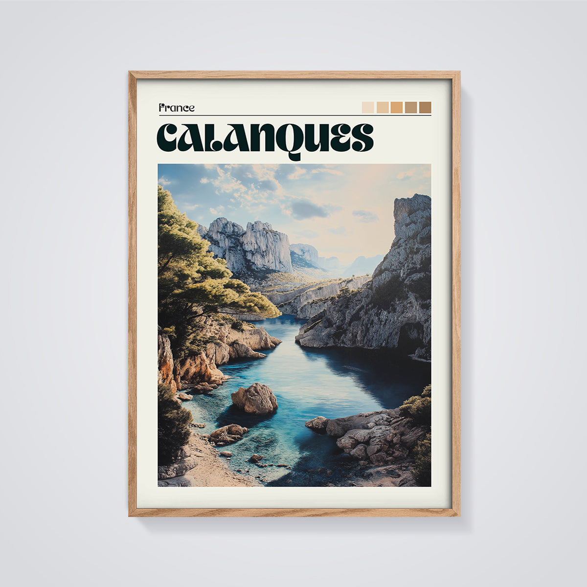 Calanques France Coastal Print framed in oak on a grey background