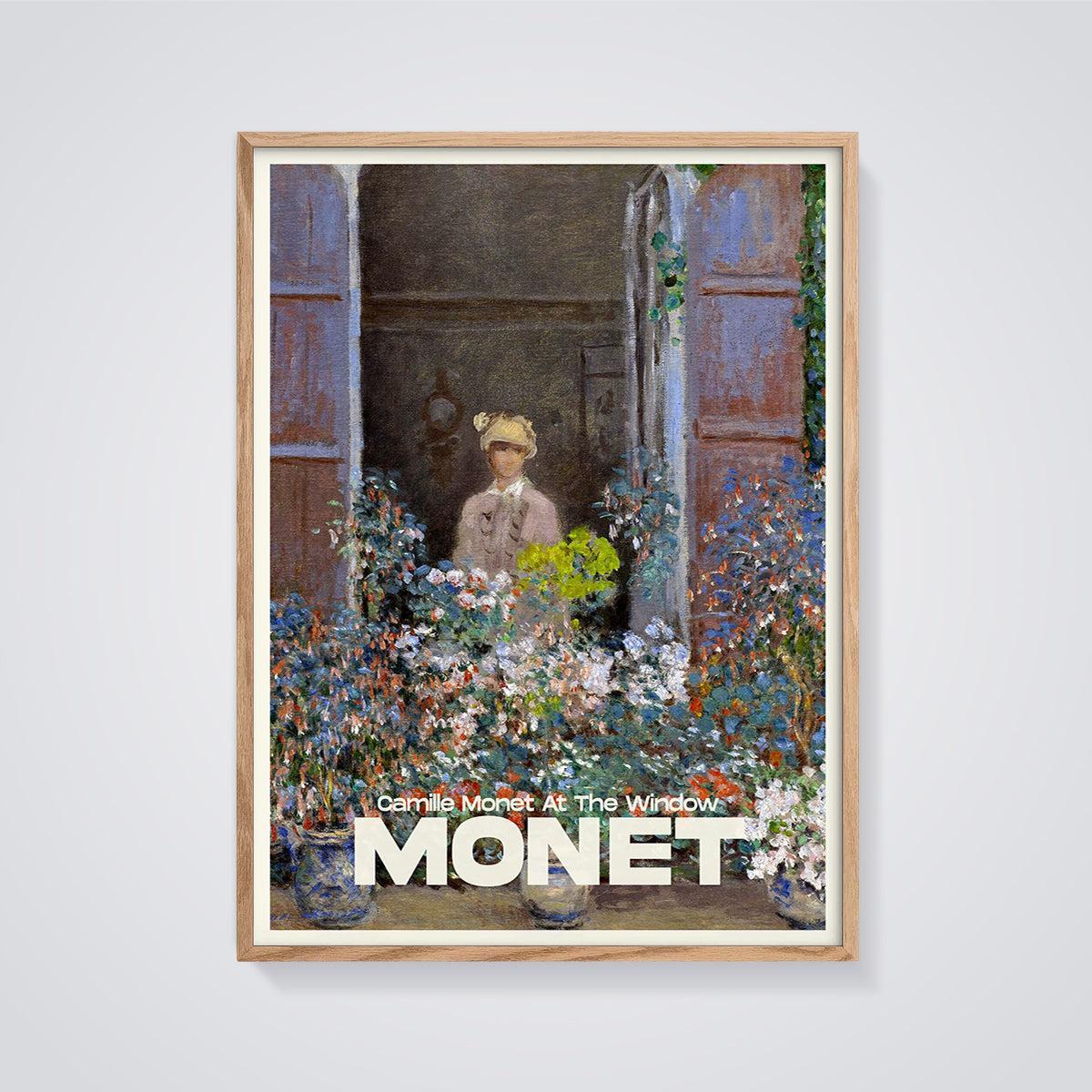 Camille Monet At The Window Print framed in oak on a grey background