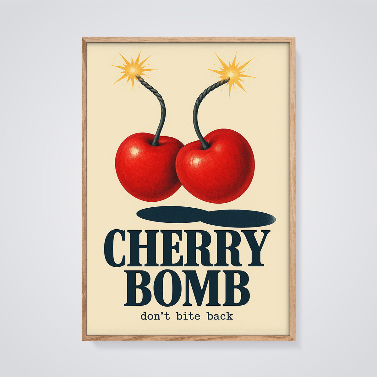 Cherry Bomb Art Print framed in oak on a grey background