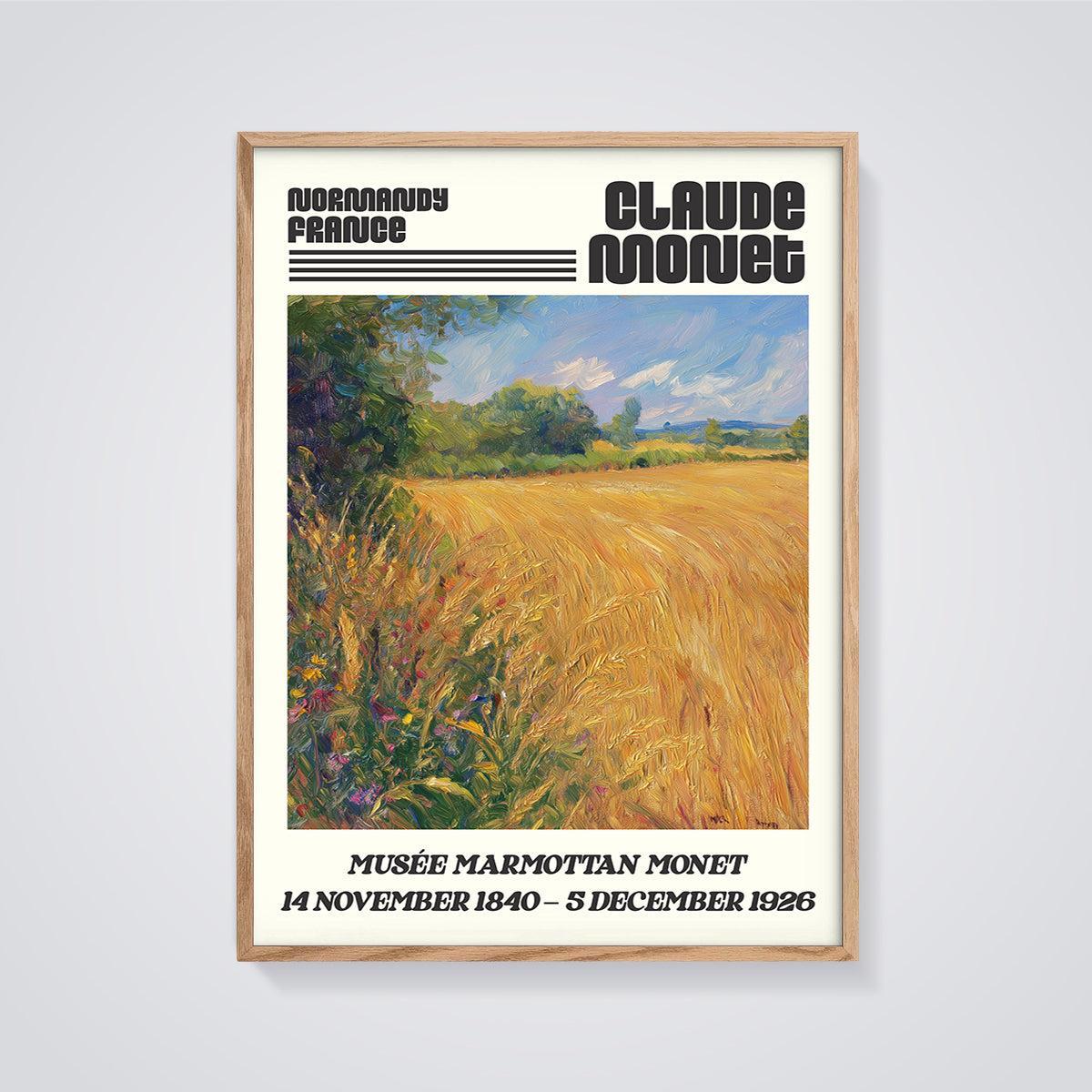Claude Monet Normandy Wheat Field Print framed in oak on a grey background