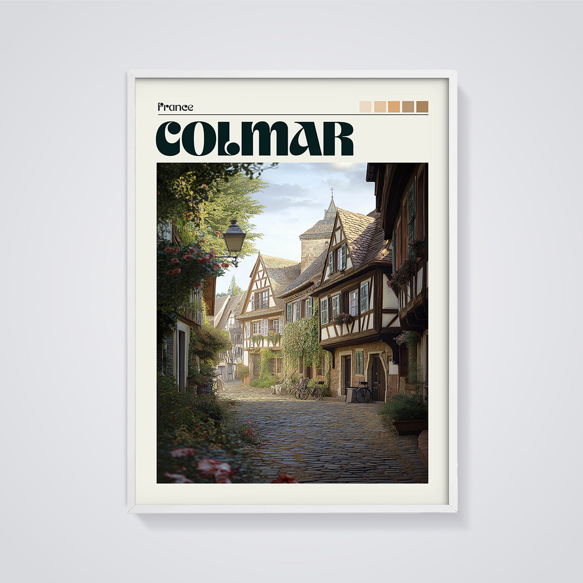 Colmar Cobblestone Street Print framed in white on a grey background