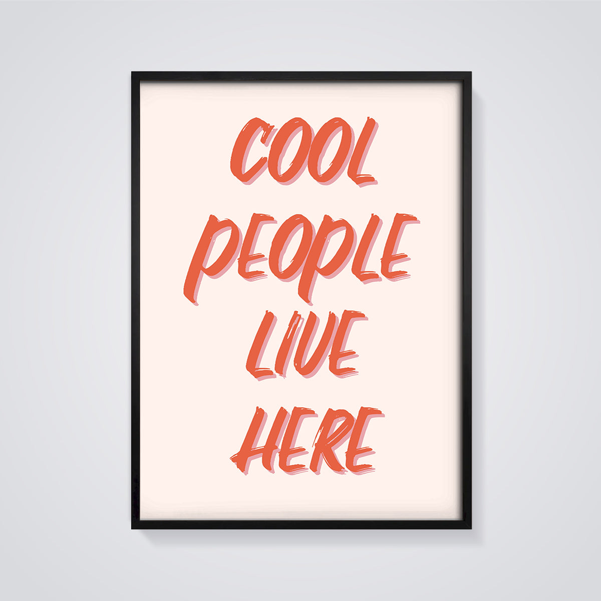 Cool People Live Here Quote Print framed in black on a grey background