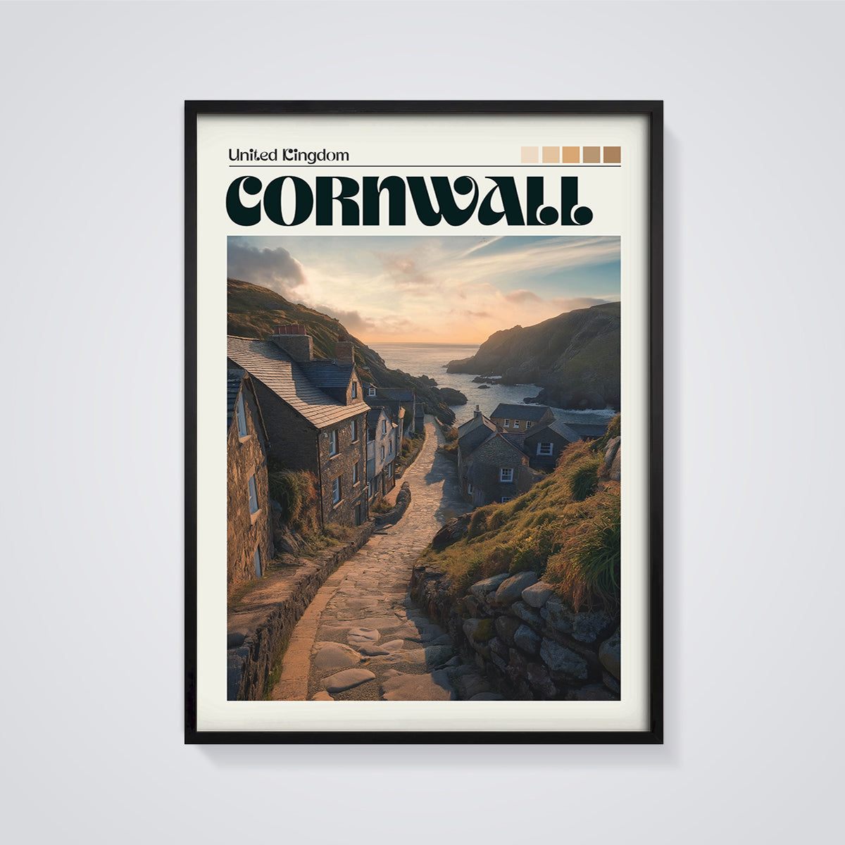 Cornwall Coastal Village Print framed in black on a grey background