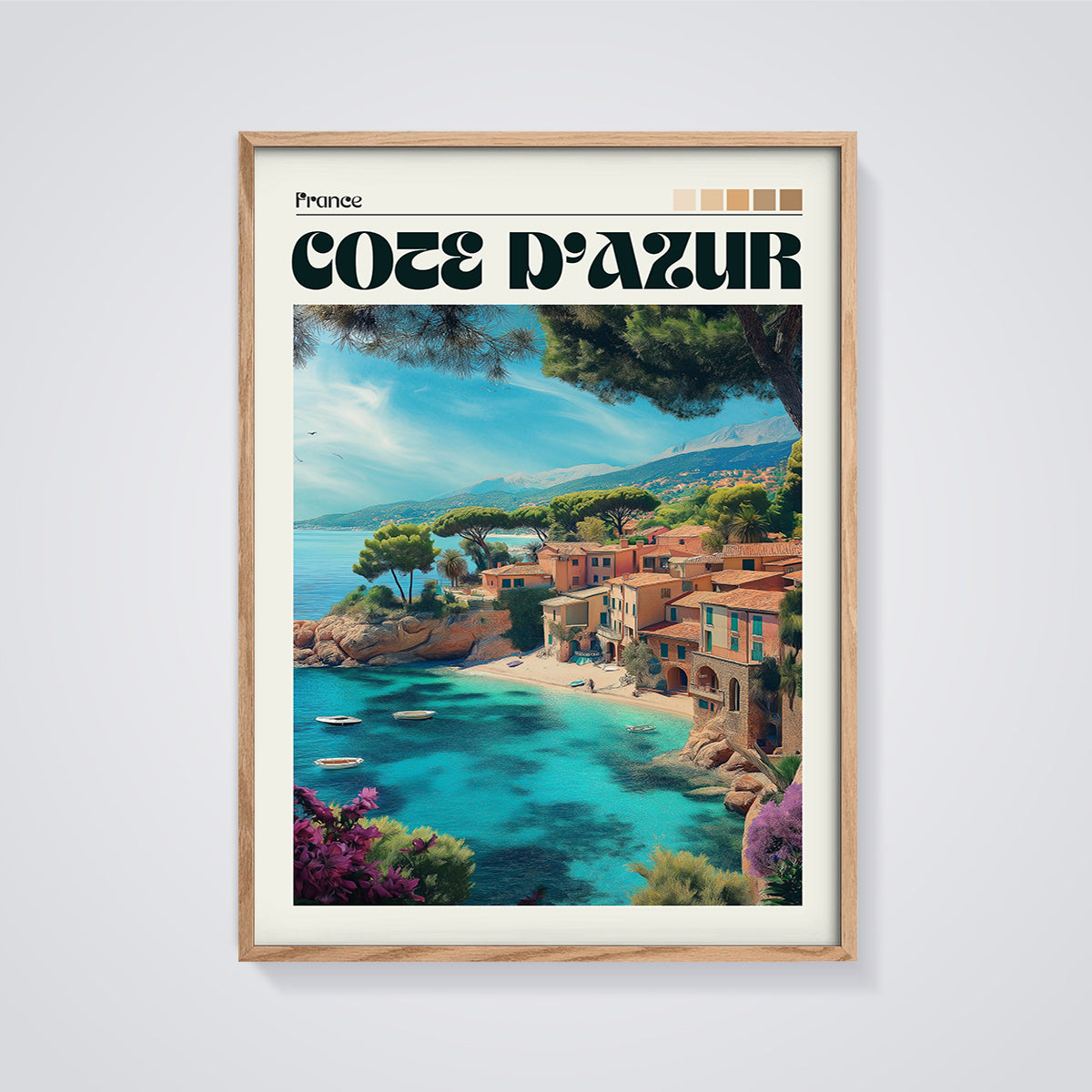 Côte d'Azur Coastal Village Print framed in oak on a grey background