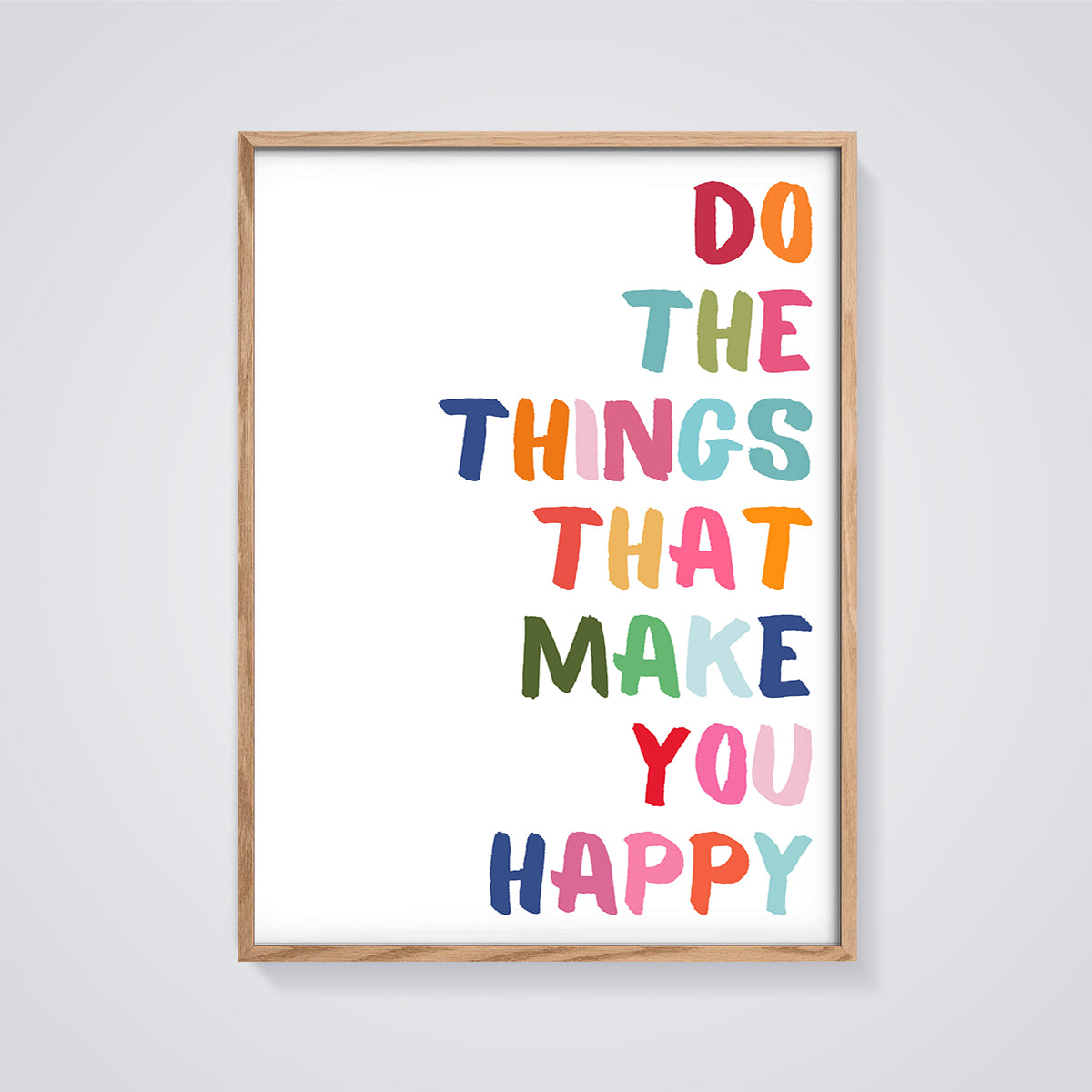 Do Things That Make You Happy Quote Print framed in oak on a grey background