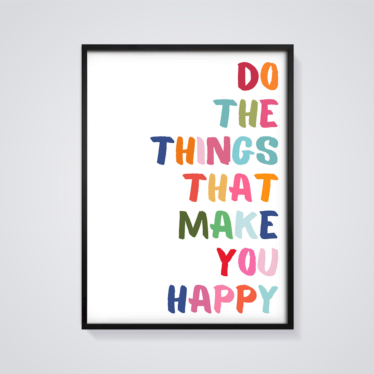 Do Things That Make You Happy Quote Print framed in black on a grey background