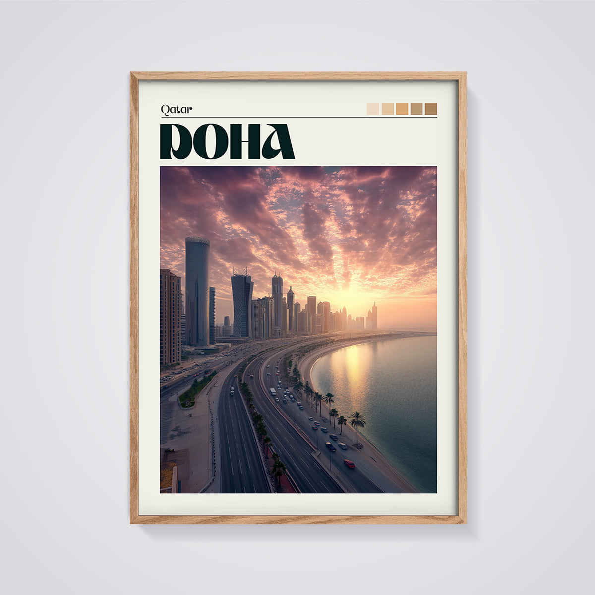 Doha Skyline Sunset Print framed in oak on a grey background