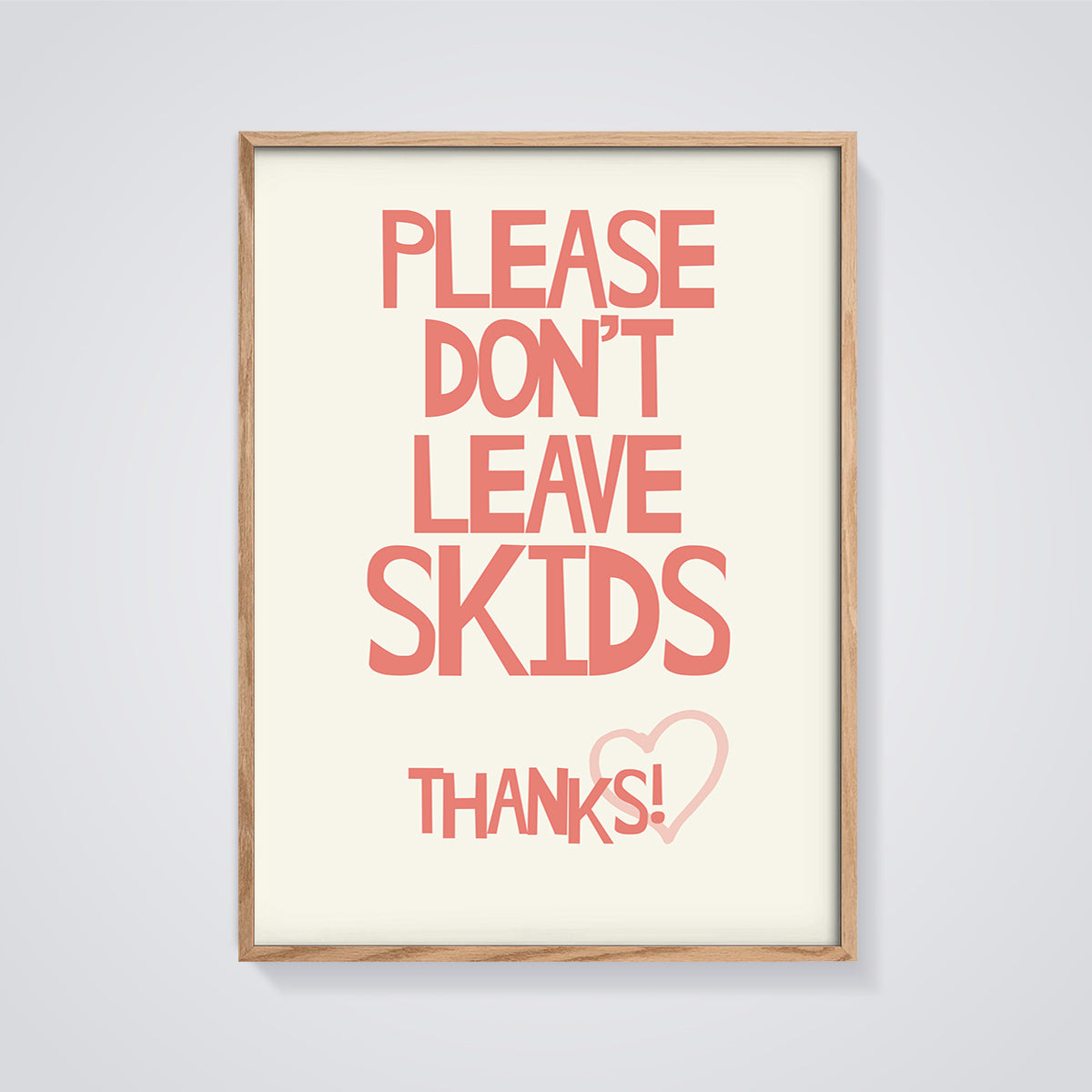 Don't Leave Skids Bathroom Print framed in oak on a grey background