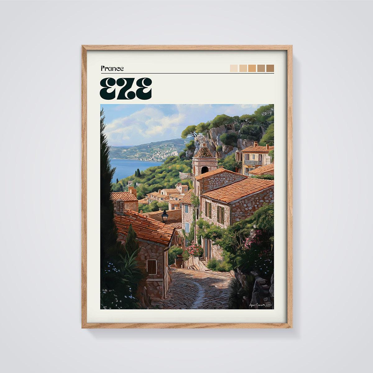 Eze France Coastal Village Print framed in oak on a grey background