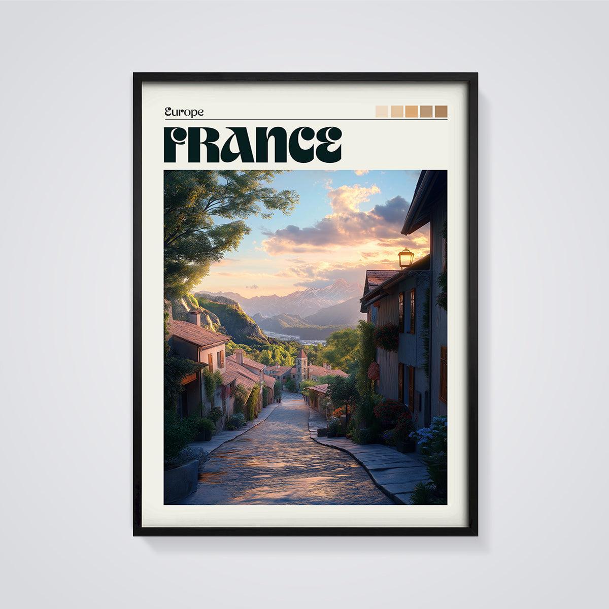 France Mountain Village Print framed in black on a grey background
