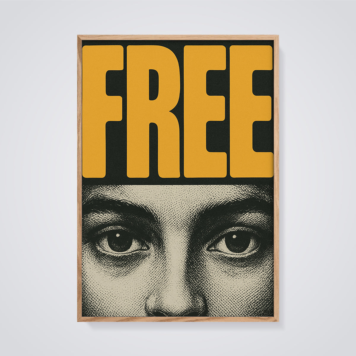 Free Eyes Print framed in oak on a grey background