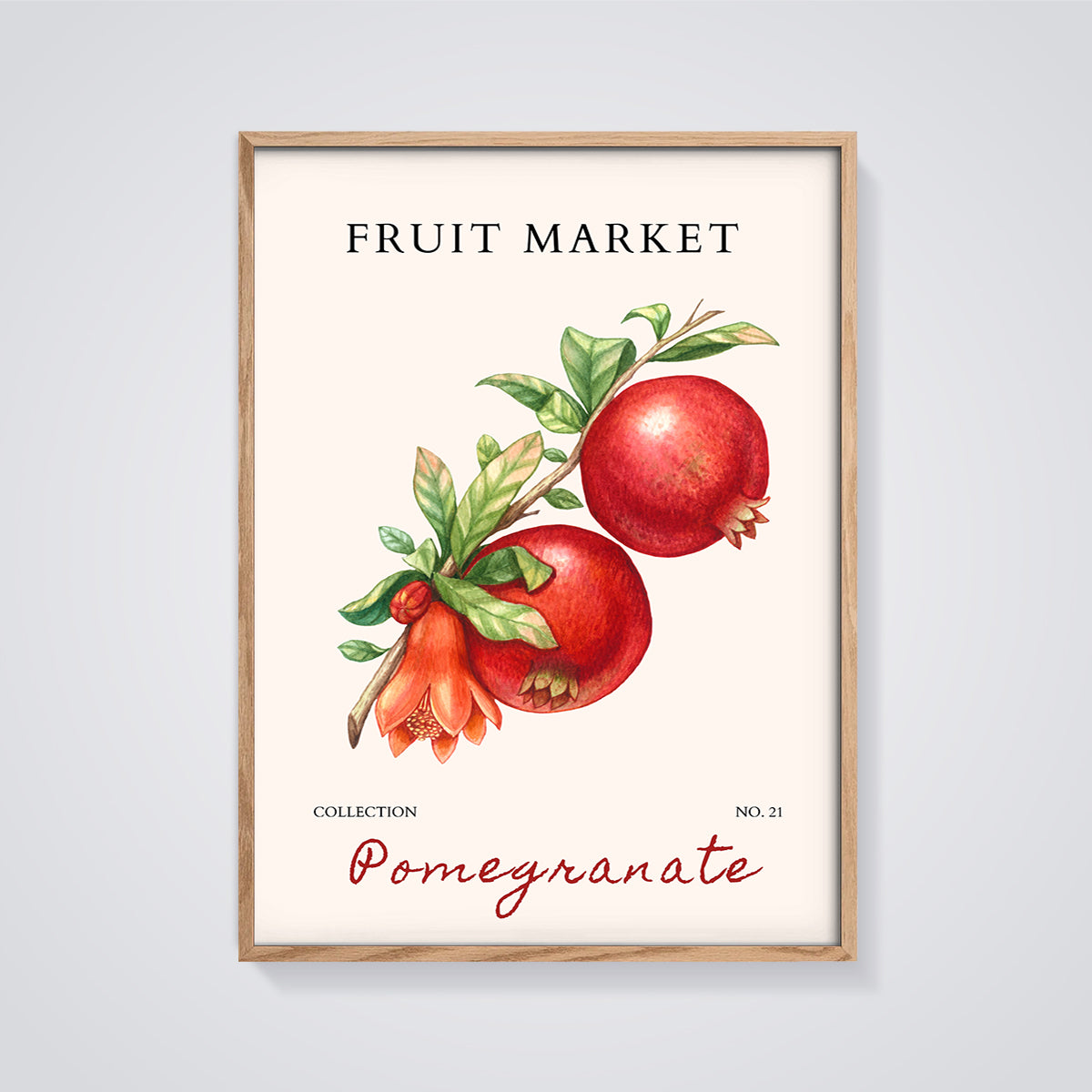 Fruit Market Pomegranate Print framed in oak on a grey background