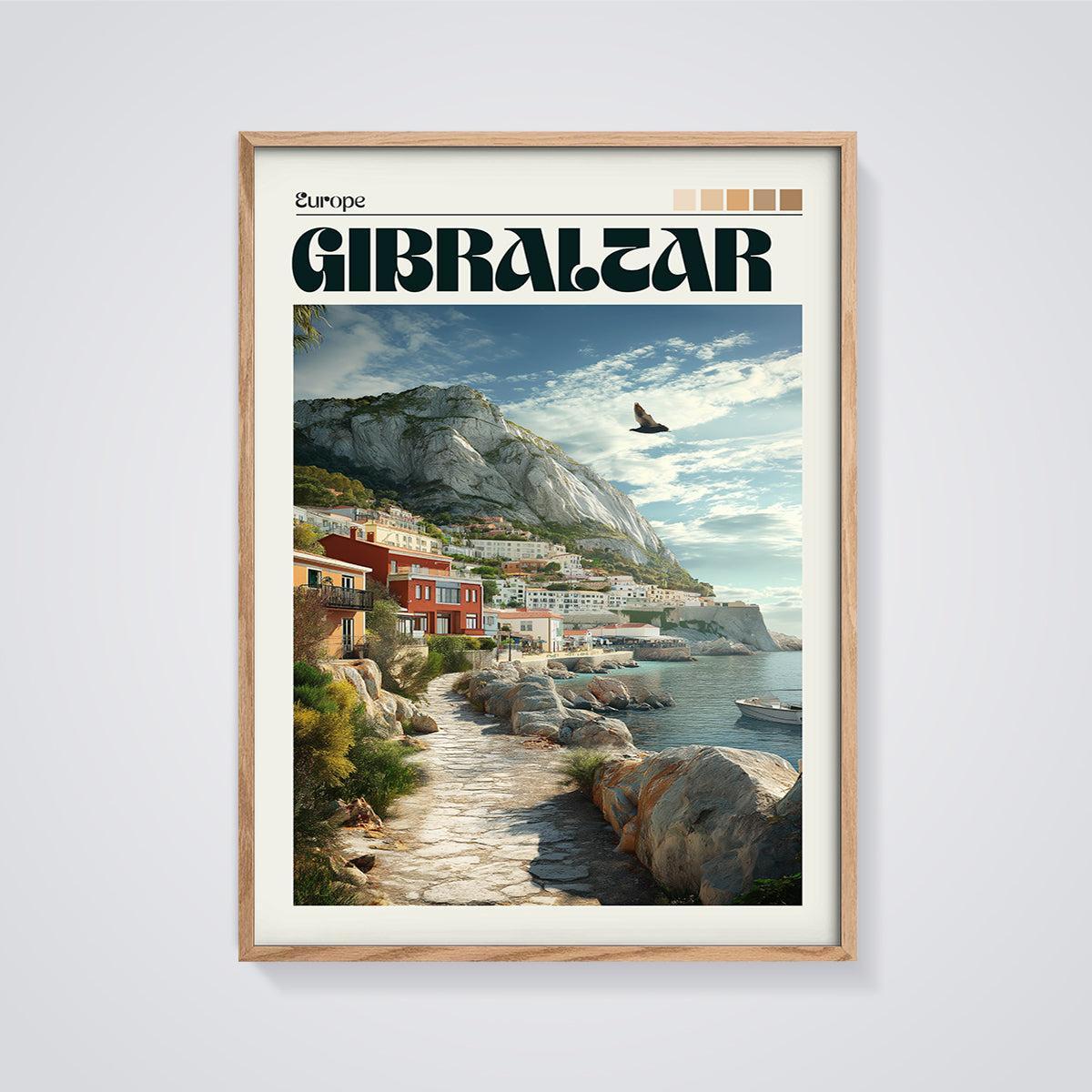 Gibraltar Coastal Village Print framed in oak on a grey background