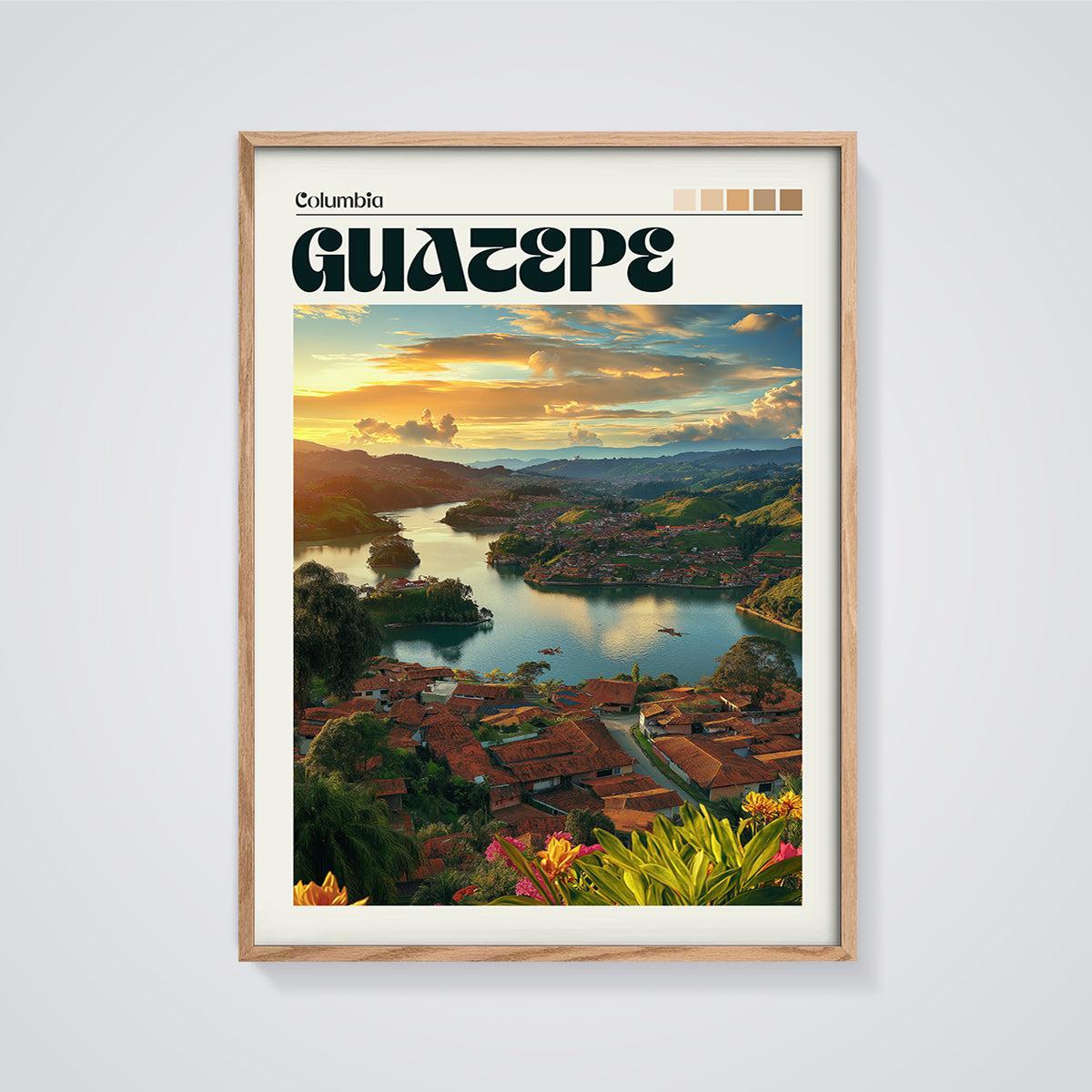 Guatapé Colombia Sunset Lake Print framed in oak on a grey background