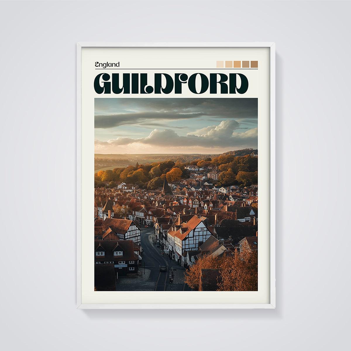 Guildford Autumn Sunset Print framed in white on a grey background