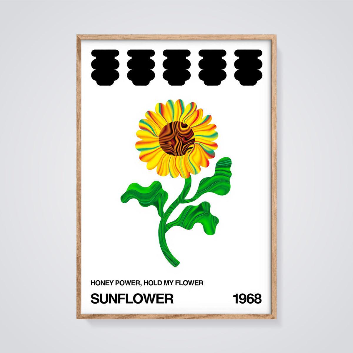 Honey Power Sunflower Print framed in oak on a grey background