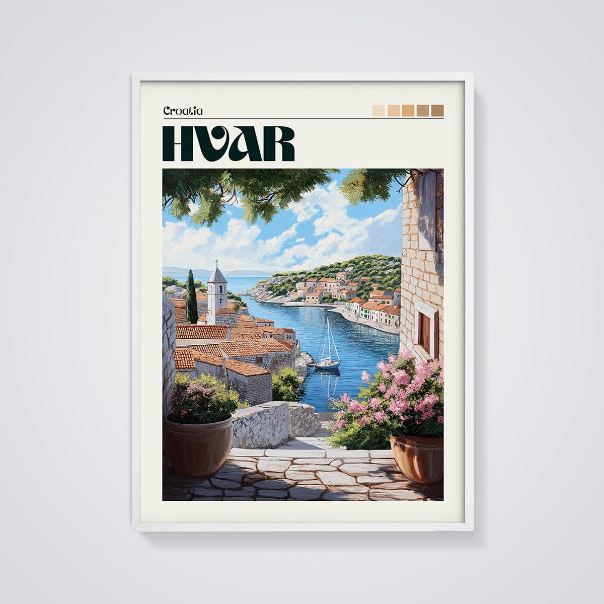 Hvar Coastal Village Print framed in white on a grey background