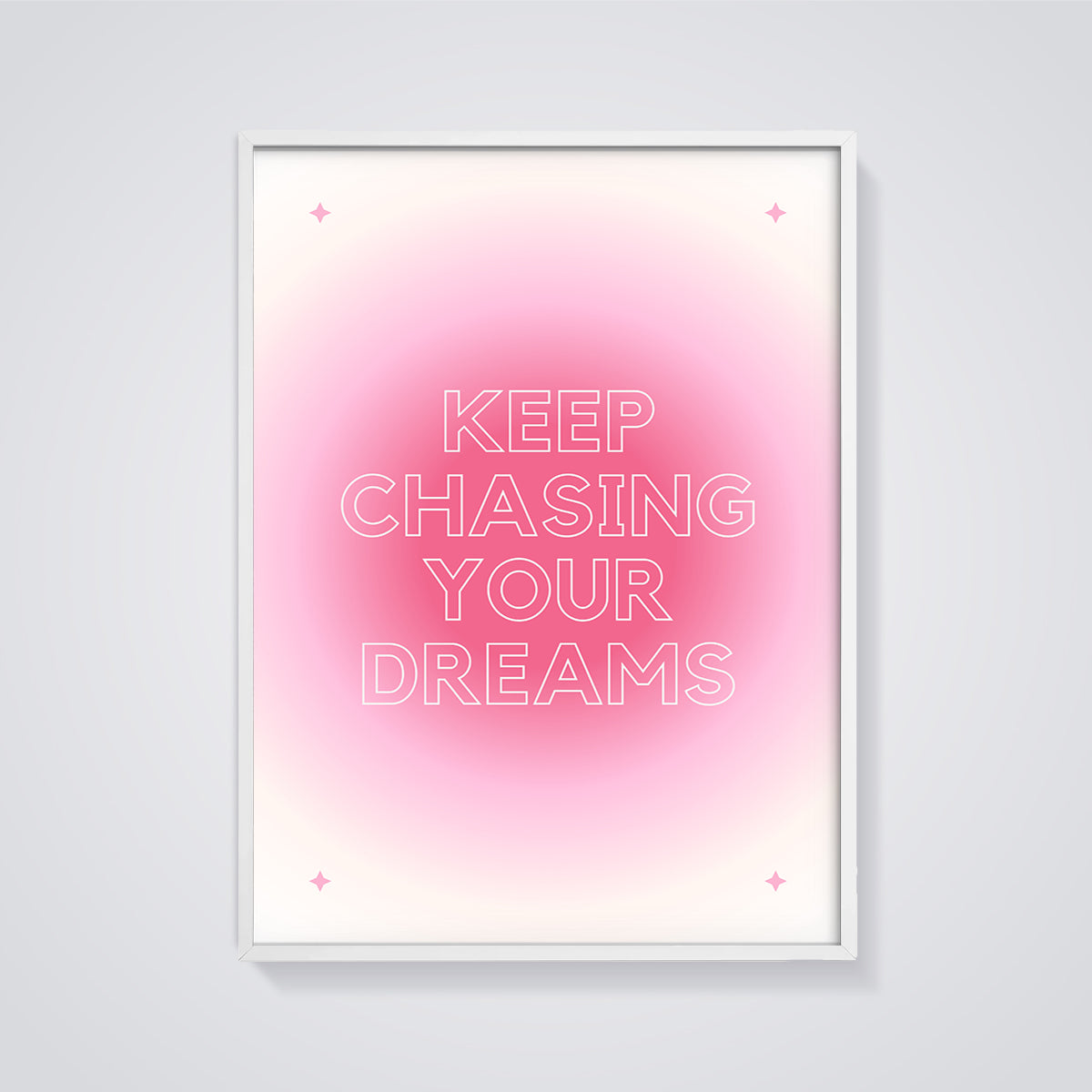 Keep Chasing Your Dreams Quote Print framed in white on a grey background