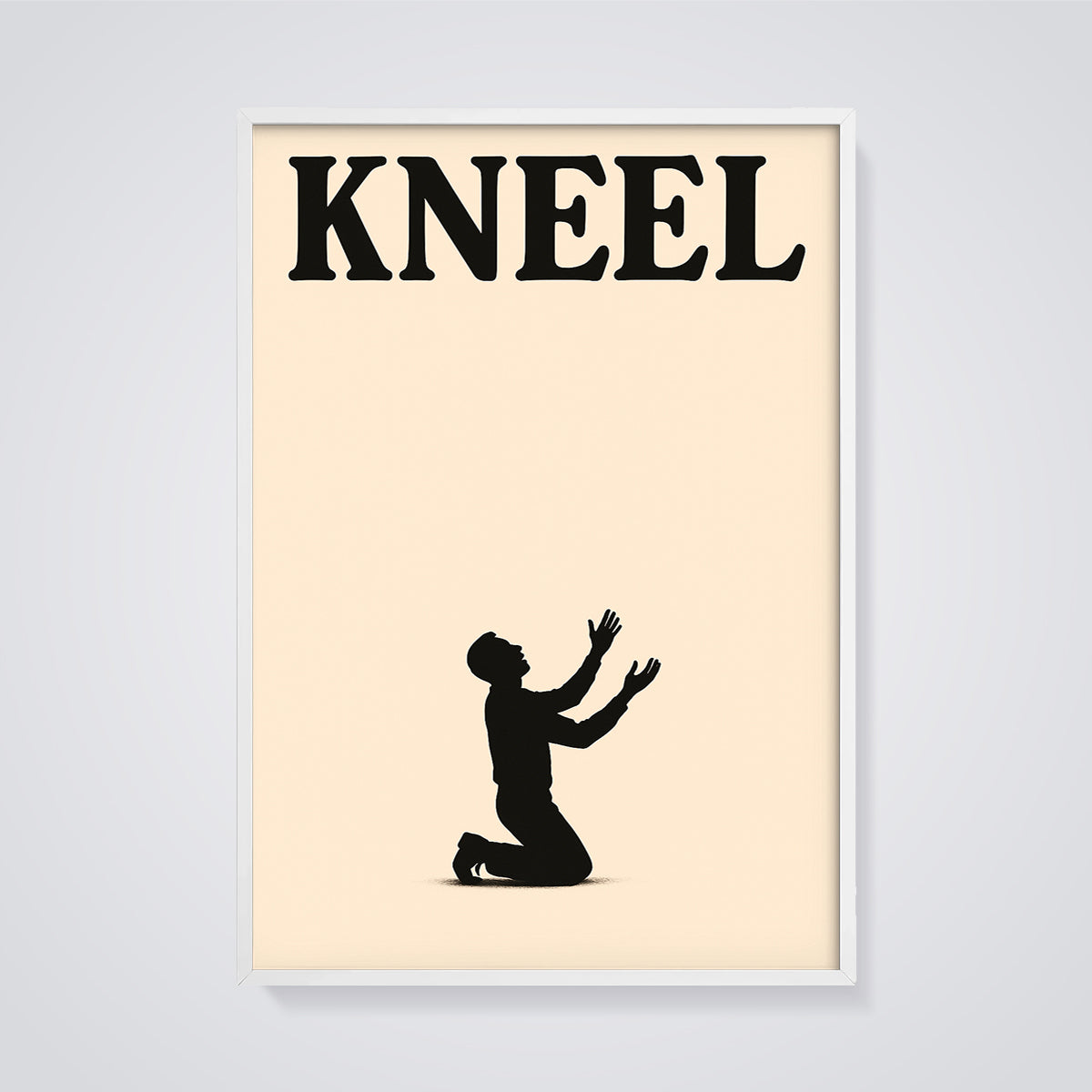 Kneel Silhouette Print framed in white on a grey background