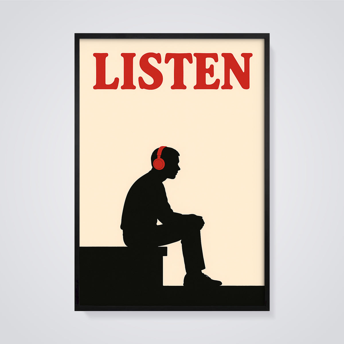 LISTEN Headphones Silhouette Print framed in black on a grey background