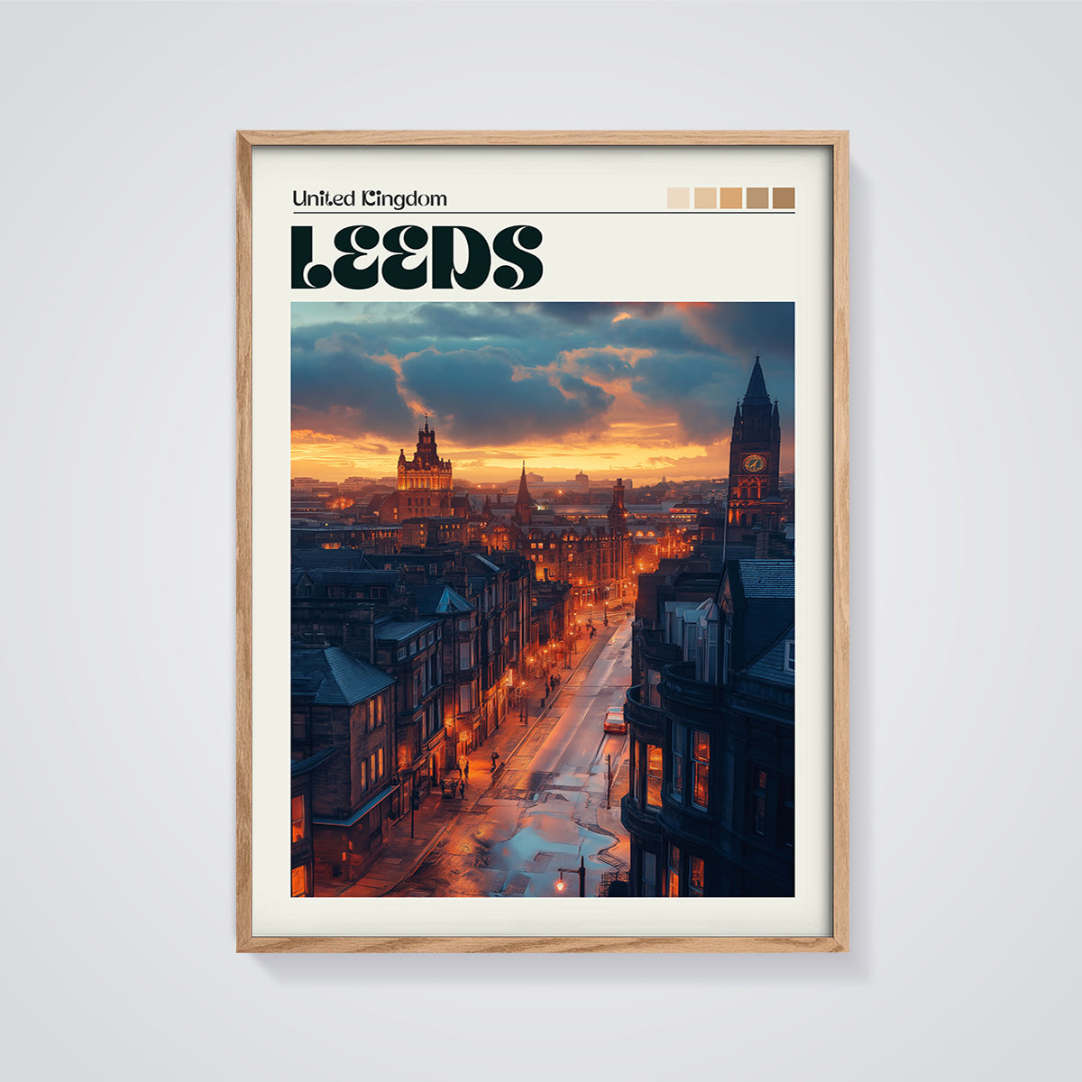 Leeds City Sunset Print framed in oak on a grey background