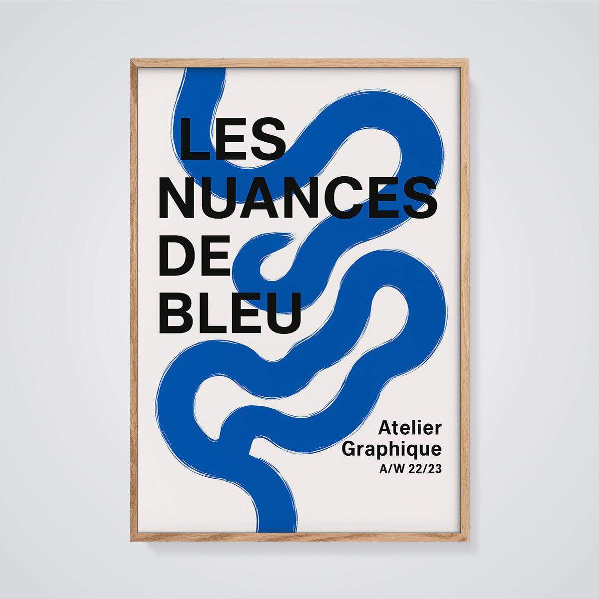 Les Nuances De Bleu Abstract Print framed in oak on a grey background