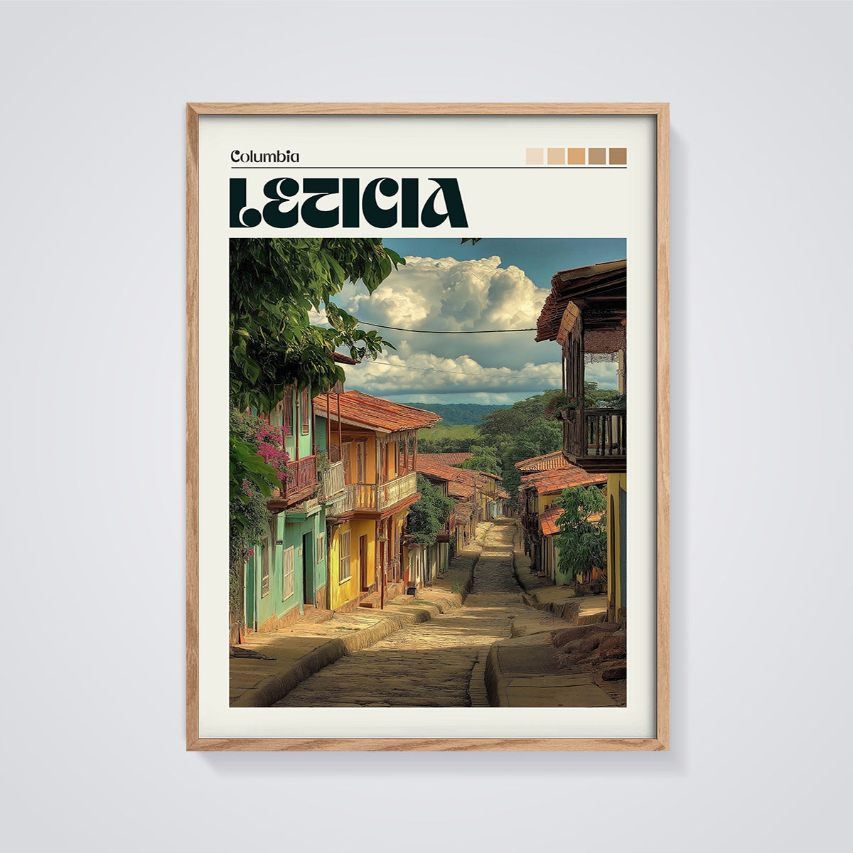 Leticia Street Scene Print framed in oak on a grey background