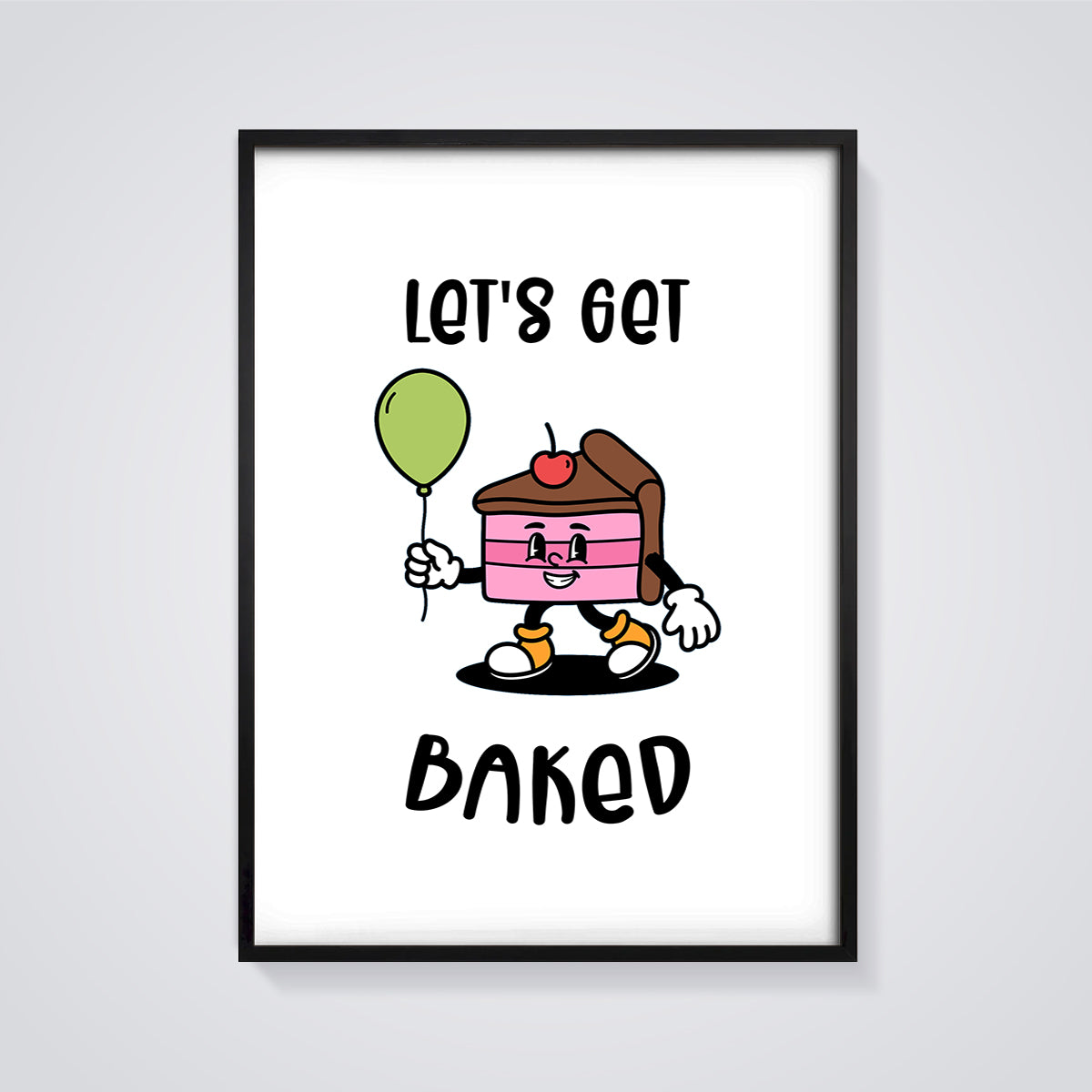Let's Get Baked Cake Slice Print framed in black on a grey background